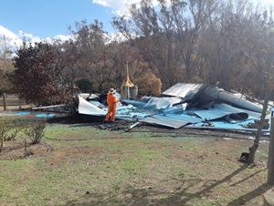 Asbestos sprayed with glue and blue dye